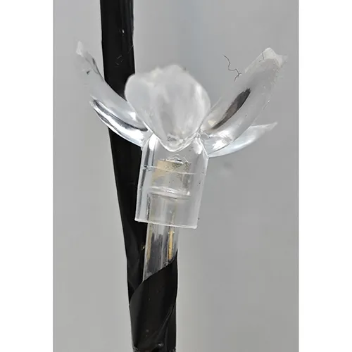 Lumină în formă de copac, cu surse de lumină LED neînlocuibile în formă de floare.