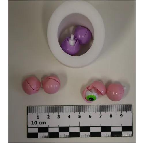 Jucărie din plastic de iepuras stoarce cu ochii care apar atunci când stomacul este apăsat.