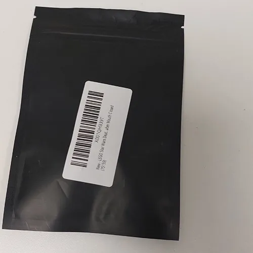 Mini toy figure with a lightsabre, intended for a building block set. Product sold online, in particular via Amazon.