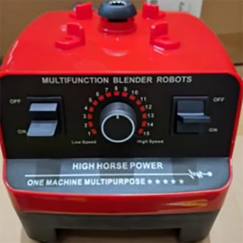 Un blender electronic de bucătărie roșie cu ceașcă detașabilă de turnare.