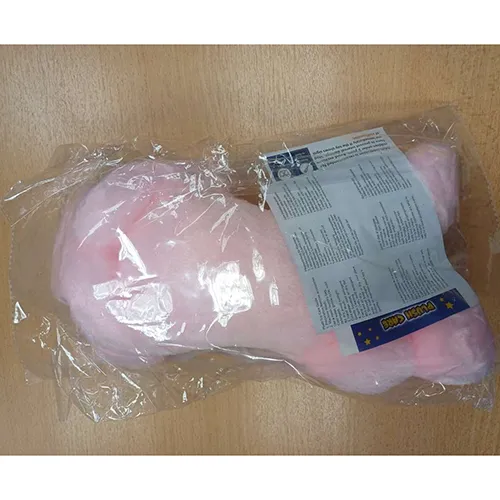 Jucărie moale, luminoasă, cu baterie, în formă de câine roz. Produs vândut online, în special prin intermediul https://vm.tiktok.com.