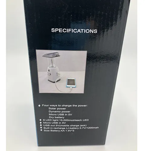 Lampă de camping cu 8 LED-uri gri, cu radio FM, cu o înălțime de aproximativ 25 cm. Alimentat prin manivelă, panou solar sau baterii AA. Produs vândut online, în special prin intermediul teknikproffset.se.