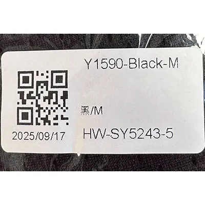 Sling pentru copii din două părți, fără deschideri integrate ale picioarelor, negru la exterior, cu o țesătură de plasă asemănătoare cu o c&acirc;rpă și inserții albe căptușite &icirc;n unele părți. Produs v&acirc;ndut online, &icirc;n special prin intermediul AliExpress (Identificatori unici: 005007565256736-12000041320277361).