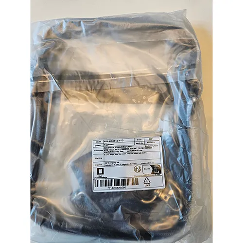 Geantă de mână transparentă din PVC cu o curea neagră. Produs vândut online, în special prin intermediul www.elkjop.no.