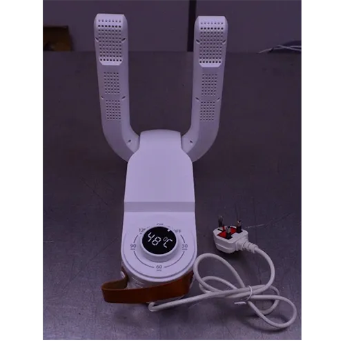 O mașină de uscare electrică albă pentru &icirc;ncălțăminte.
