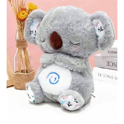 Respir&acirc;nd jucărie urs koala.